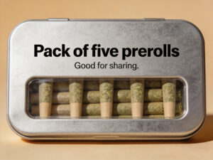 Pack of five cannabis prerolls in a sleek metal container, labeled "Pack of five prerolls. Good for sharing," showcasing the rolled joints ready for convenient use.