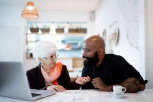 older woman being councilled by a young man