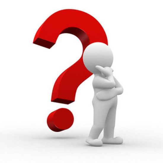 A large question mark and character standing next to it.