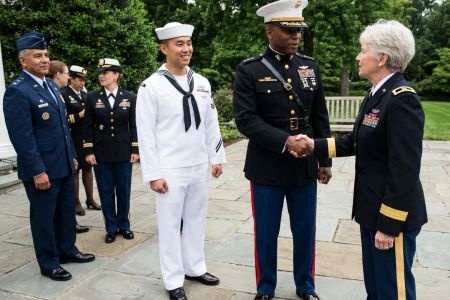 men and woman in military dress